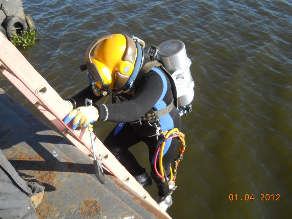 Diver on barger removal project